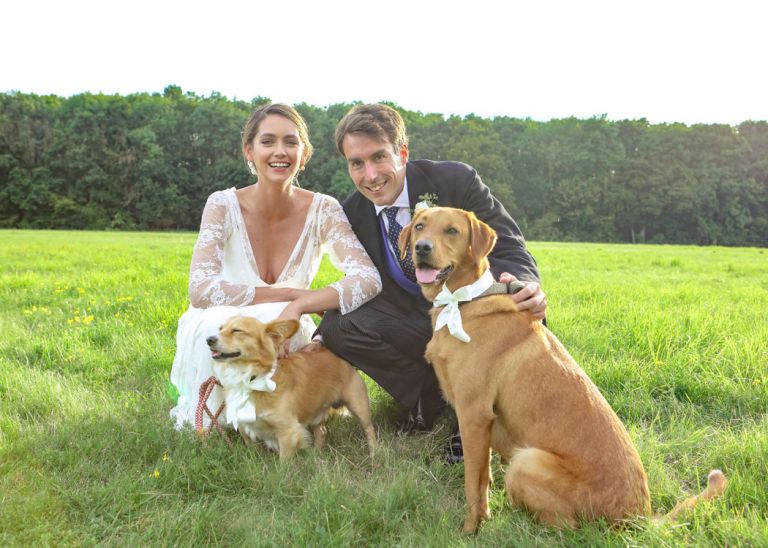 A photo of a wedding couple and their dogs at a Wedding at Hungarian Hall captured by Hayley Denston Photography 