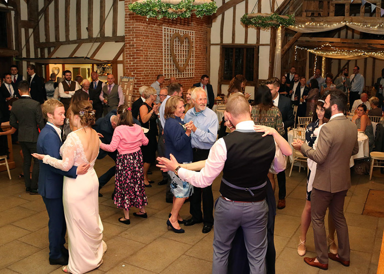 Dancing at Haughley Park Wedding Venue on a wedding day photographed by Suffolk Wedding Photographers Hayley Denston Photography