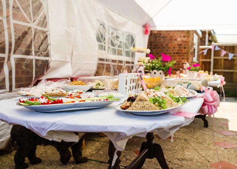 A wedding reception homemade buffet on a wedding day in Suffolk captured by Suffolk Wedding Photographers Hayley Denston Photography