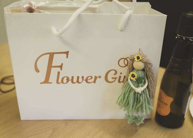 A flowergirl bag and little peg doll made for her at Hungarian Hall on a Wedding Day photographed by Suffolk Wedding Photographers Hayley Denston Photography