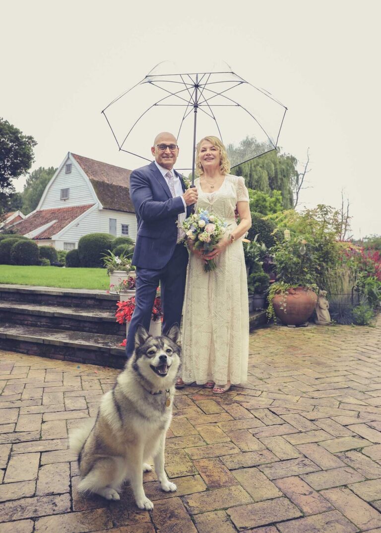 A bride and groom and their granddog at Letheringham Water Mill on a wedding day by Suffolk Wedding Photographers Hayley Denston Photography