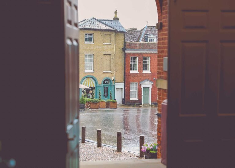Woodbridge Shire Hall and Woodbridge Market Square on a rainy wedding day photographed by Suffolk Wedding Photographers Hayley Denston Photography