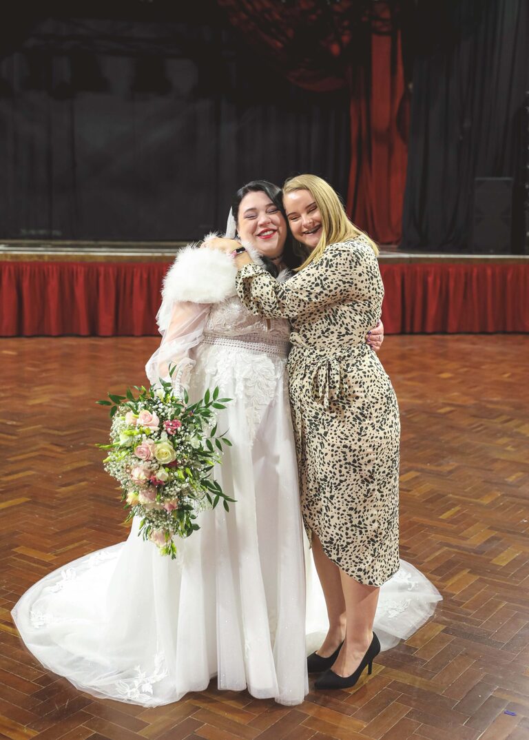 A bride and her bestfriend at Ipswich Town Hall taken by Suffolk Wedding Photographer Hayley Denston Photography