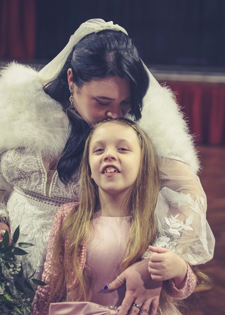 A bride and her daughter at Ipswich Town Hall taken by Suffolk Wedding Photographer Hayley Denston Photography