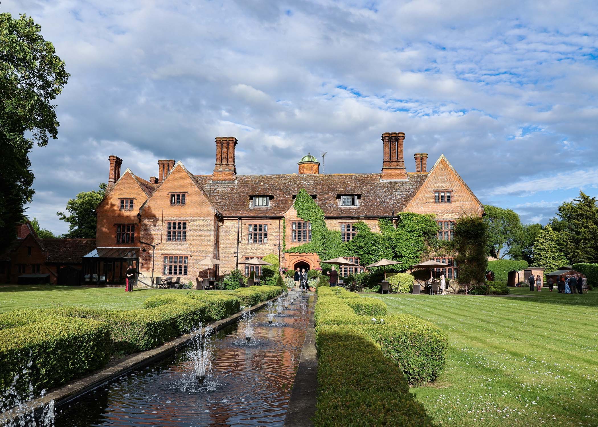 Woodhall Manor at sunset on a wedding day at Woodhall Manor captured by Suffolk Wedding Photographer Hayley Denston Photography
