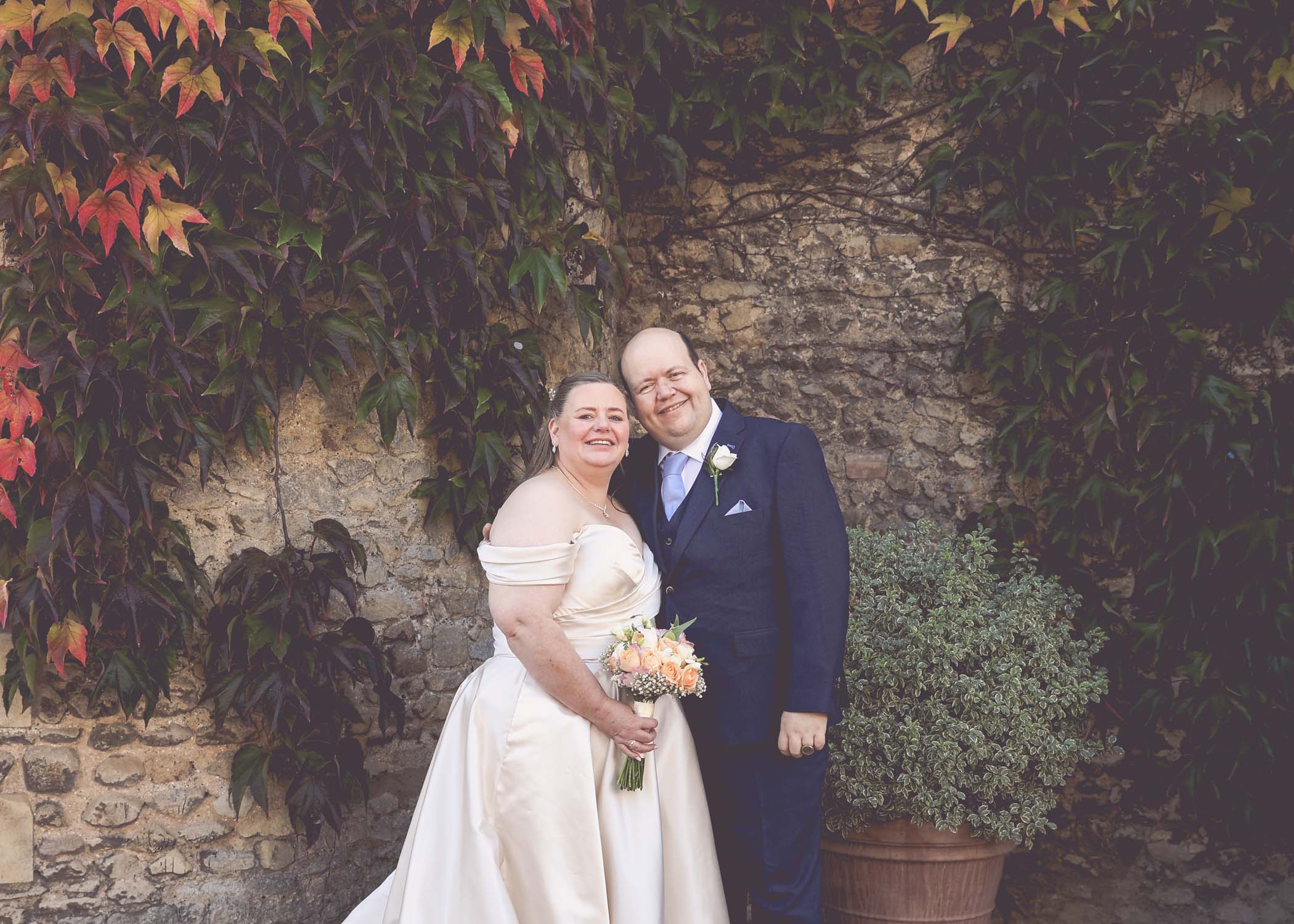 A bride and groom at St andrews castle bury st edmunds on a wedding day captured by Suffolk Wedding Photographer Hayley Denston Photography