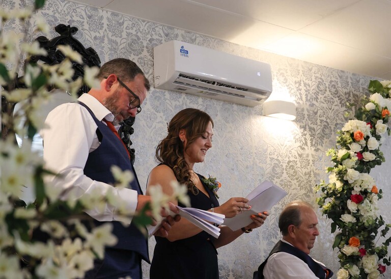 A bestwoman and bestman giving wedding speeches on a wedding day at Venue 16 captured by suffolk wedding photographer Hayley Denston Photography