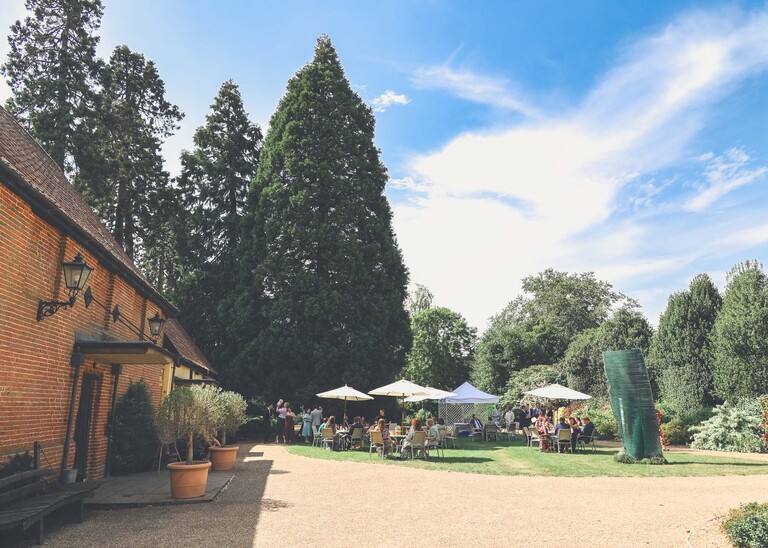 A wedding reception on a wedding day at Haughley Park Barn photographed by suffolk wedding photographer Hayley Denston Photography